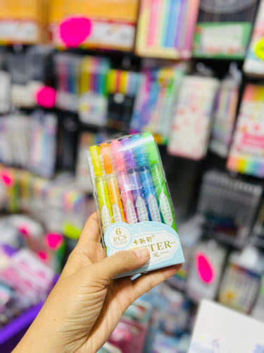 Plumones de glitter.